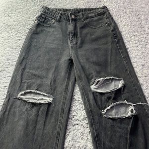 Black lightly worn jeans with rips